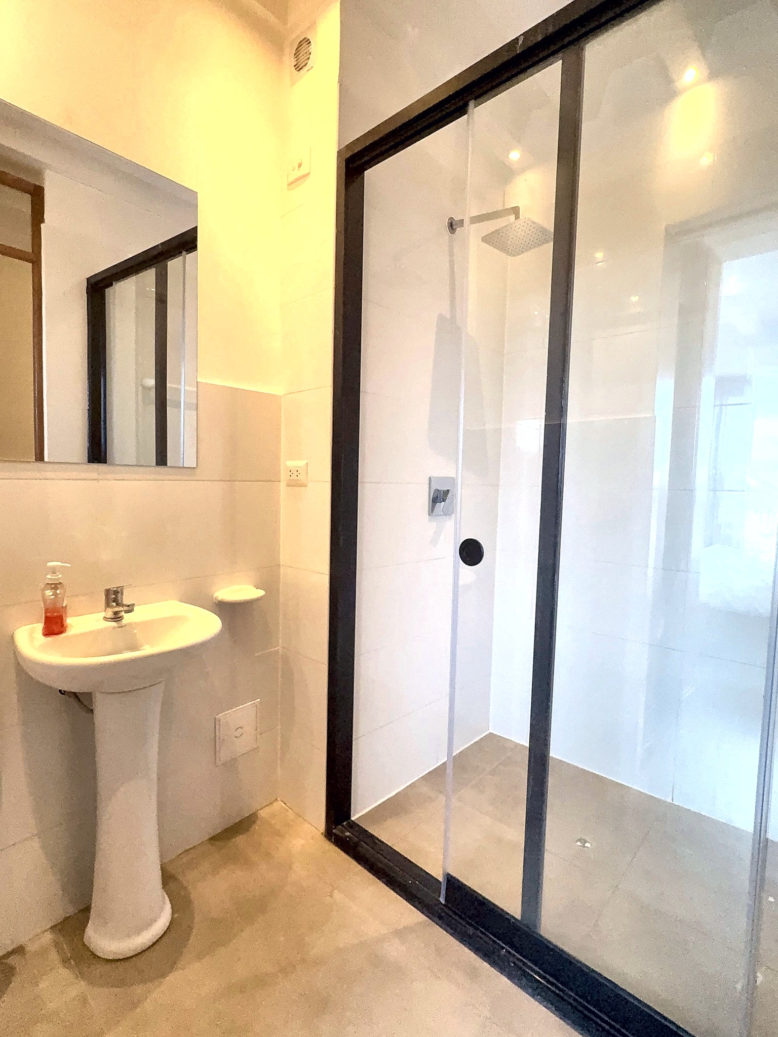 Glass-shower bathroom (one of three)