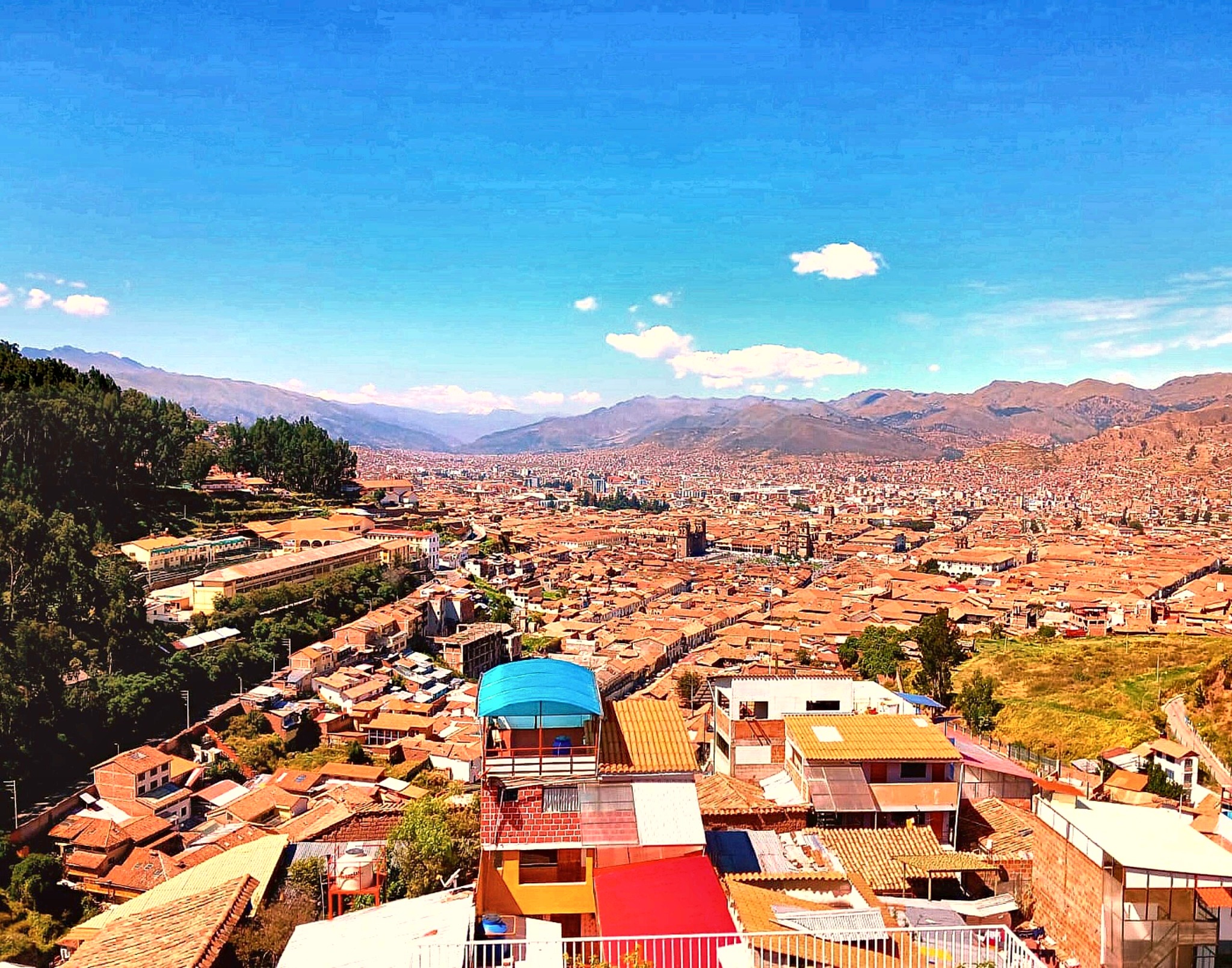 Golden-hour panorama across the Cusco valley