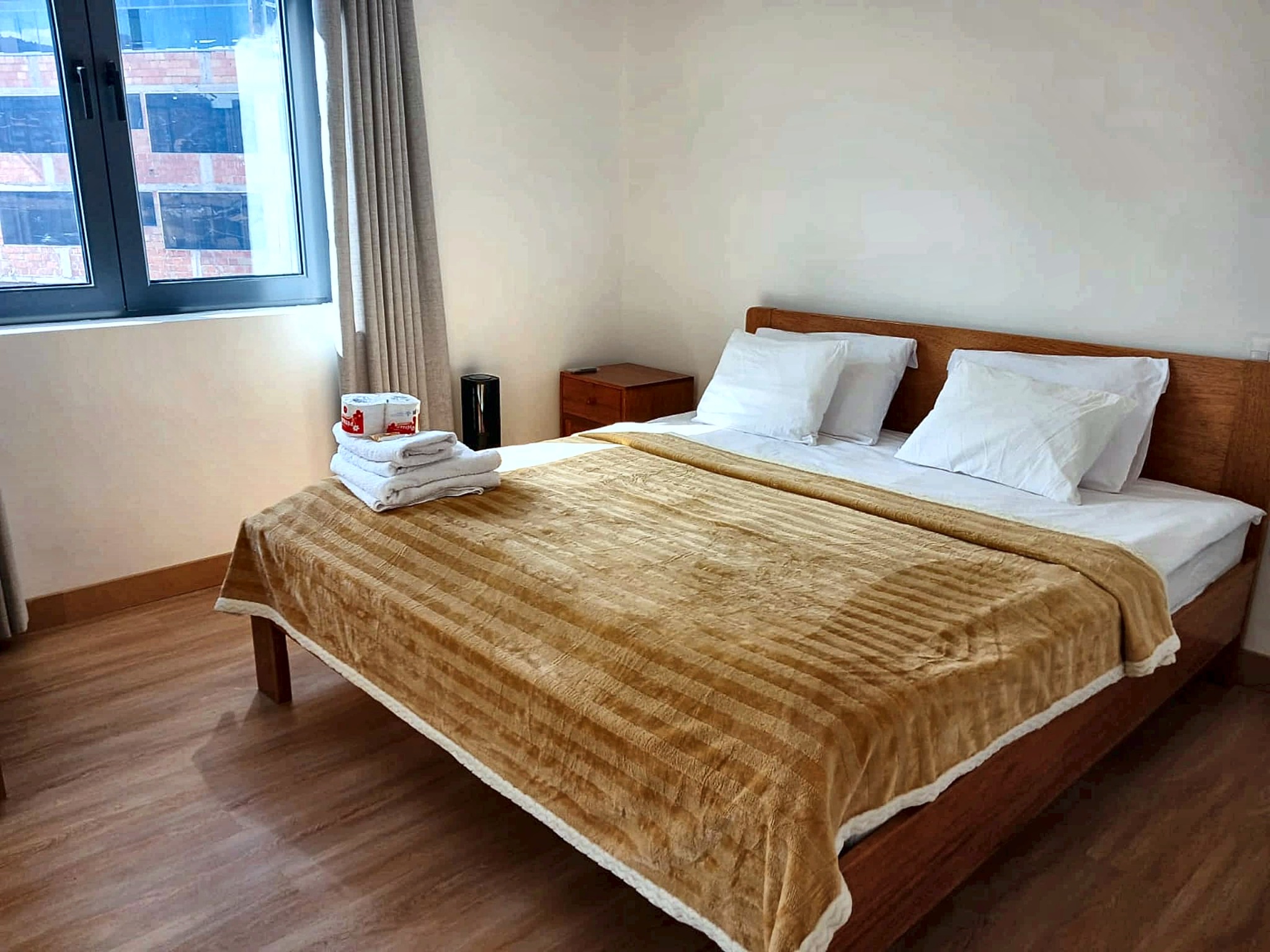 Bedroom with warm Andean textiles