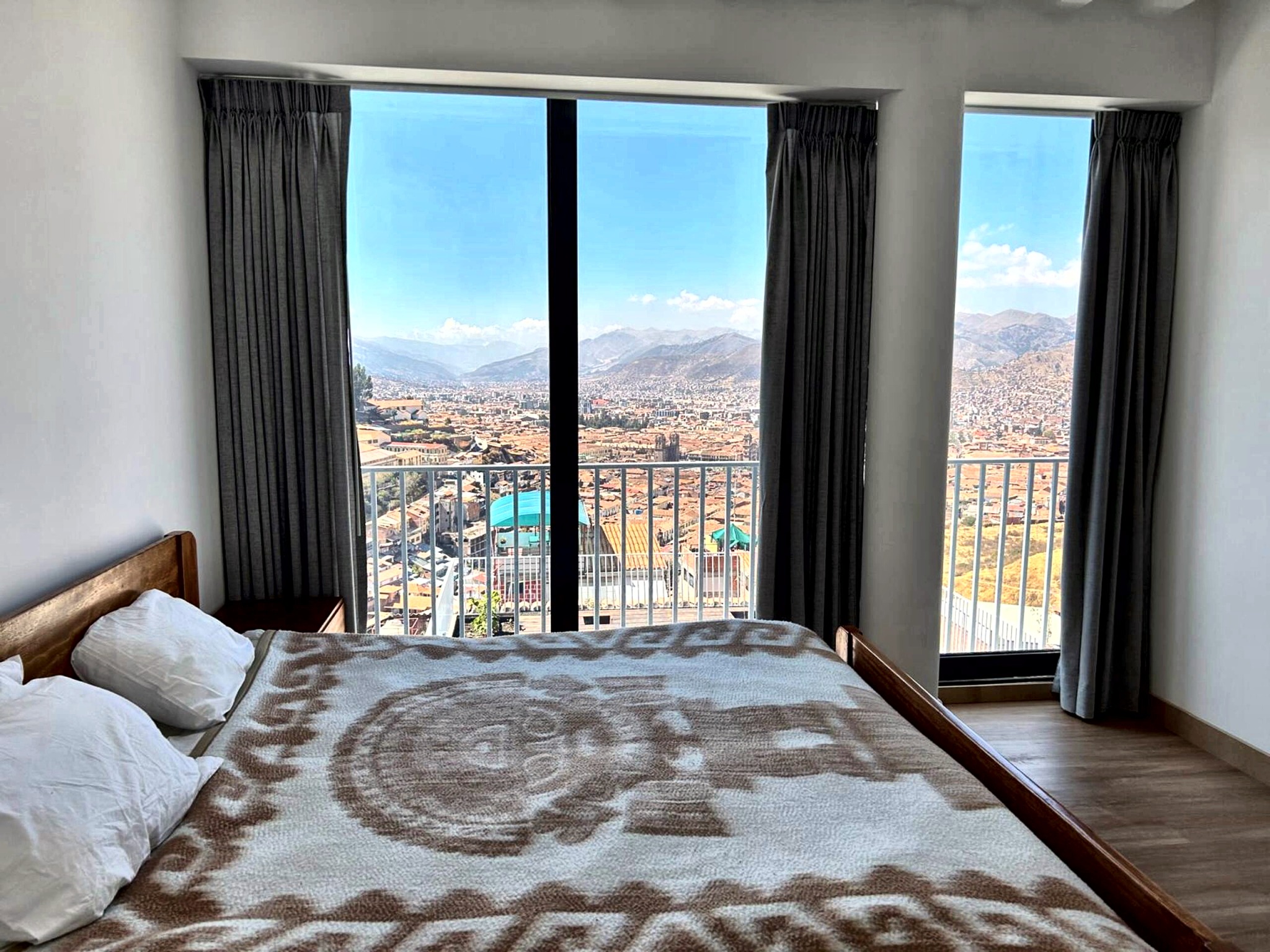 Bed opening to a full panoramic window