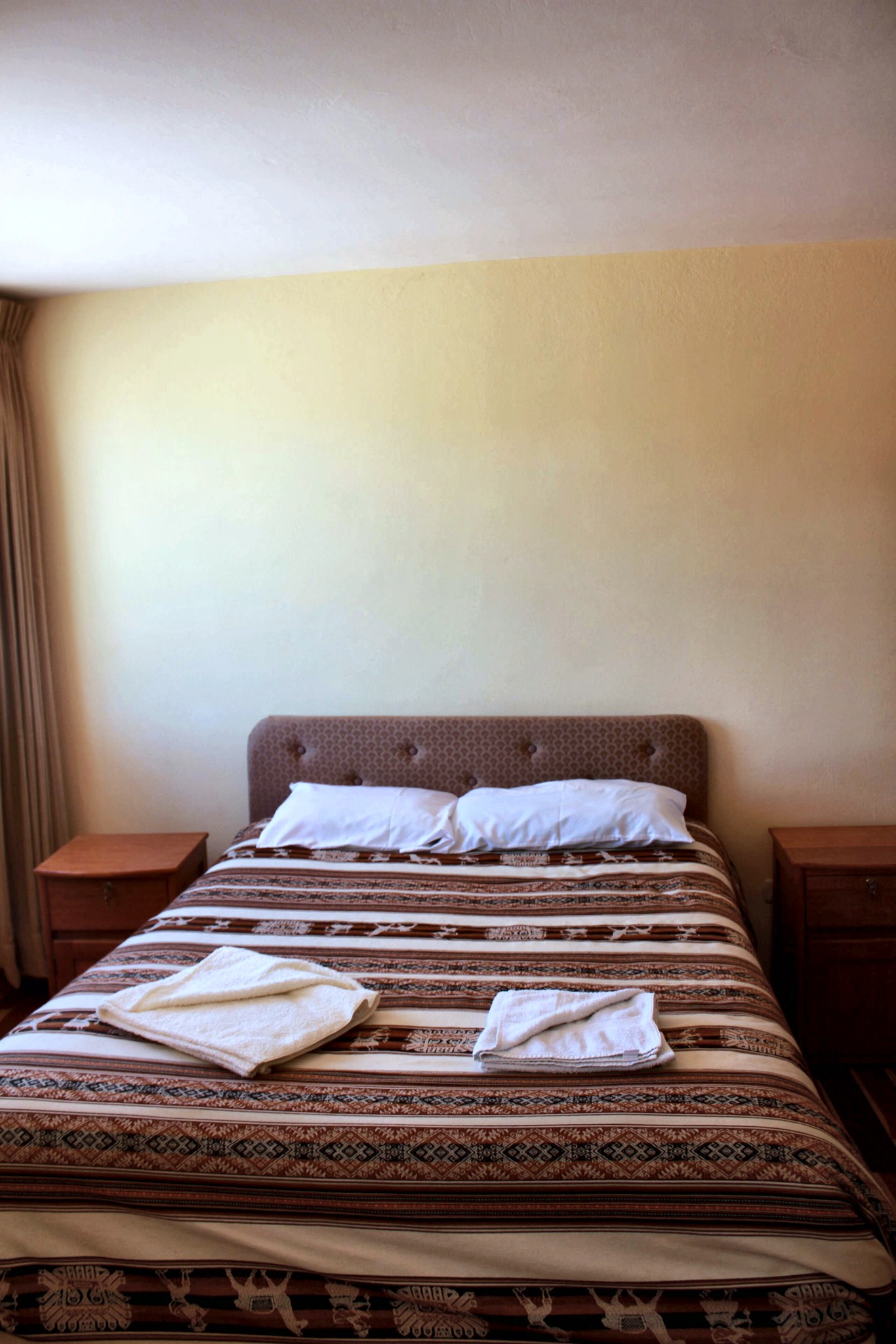 Warm bedroom with Andean textiles