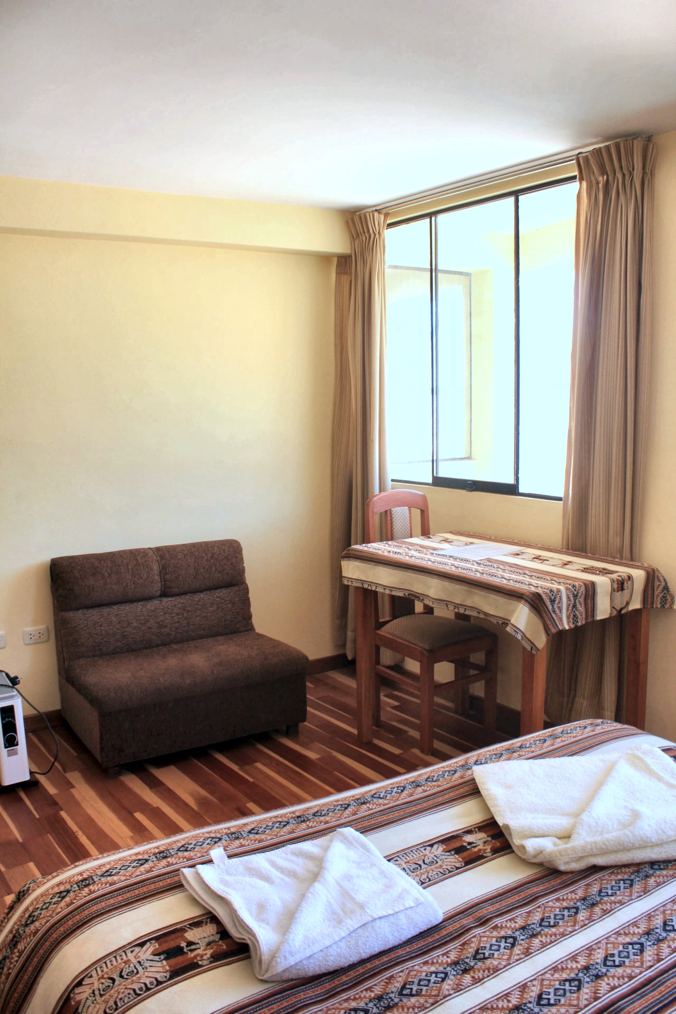 Bedroom with sofa seating